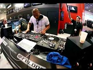 DJ Angelo performs at the Musikmesse show on the Reloop stand.