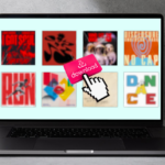 A silver laptop sits against a grey concrete background. There is a design displayed on the laptop screen: a retro hand icon and a red-and-white-coloured download icon sit at the centre. Behind it are various blurred track singles against a pale blue background.