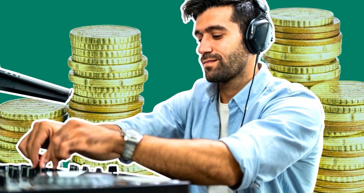 A white bearded man wearing black headphones and a light blue button-up shirt smirks while DJing on a controller. Behind him are stacks of gold coins set against a green background.