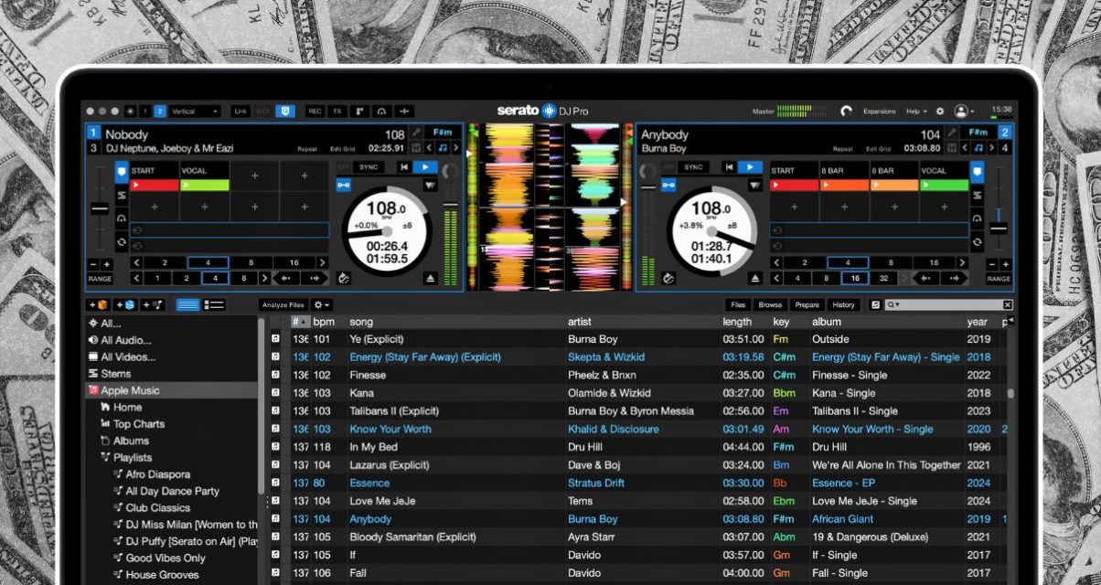 Serato DJ software on a laptop. In the background is semi transparent pictures of $100 bills.