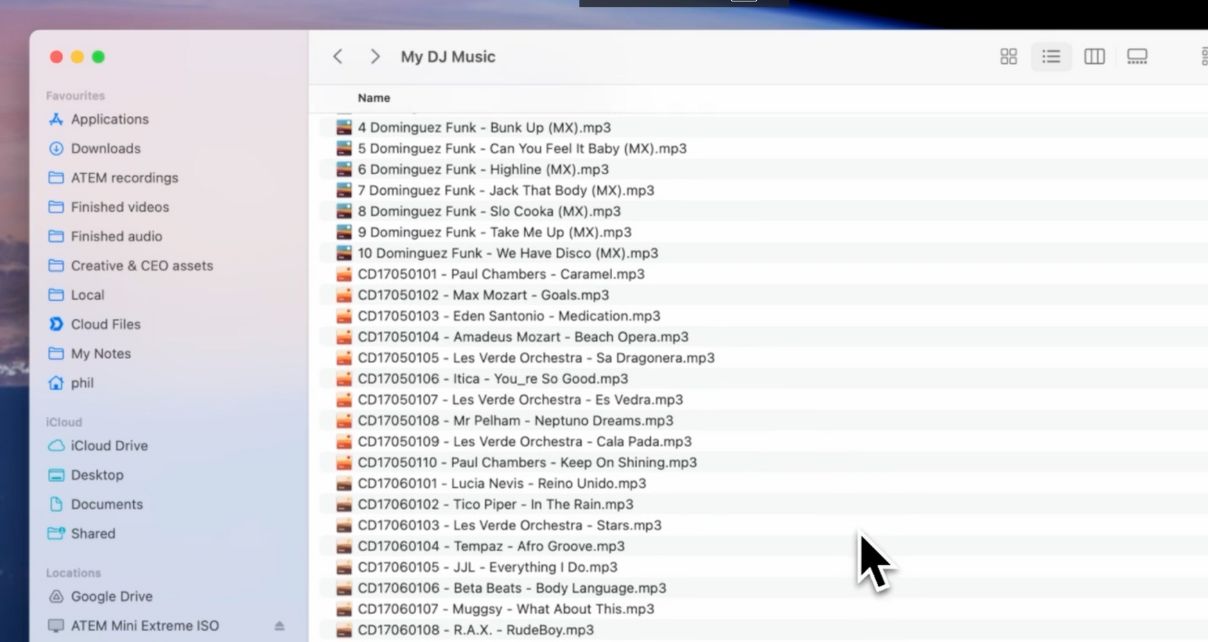 A folder titled "My DJ Music" containing a variety of audio files. 