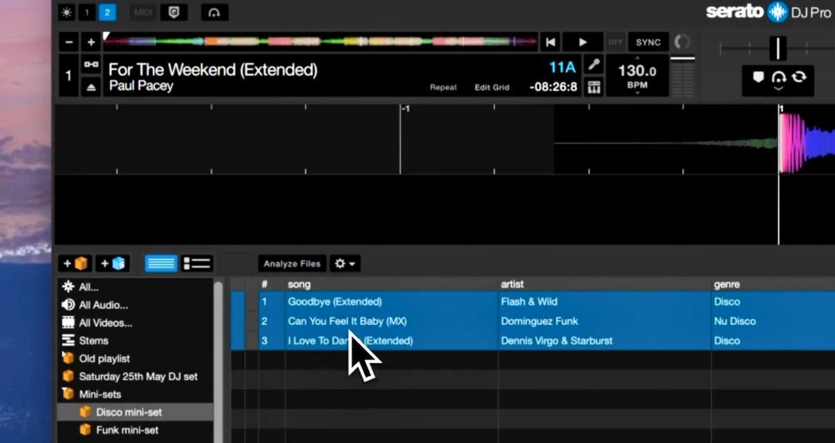 Several playlist folders inside Serato DJ Pro software. Three songs are highlighted within a playlist called "Disco mini-set". 