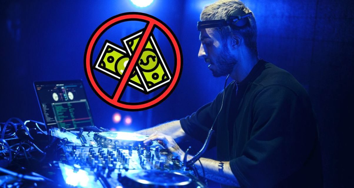 A young white male DJ with short hair and black clothing stands behind a DJ booth in a nighclub, surrounded by professional gear. Floating next to him is a graphic with two green bills crossed out with a red circle icon. The whole photo is bathed in dark blue lighting.