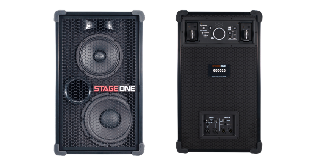 A black dual-speaker system with a hexagonal grille, labeled "STAGE ONE," in red and white lettering, showcasing front speakers and back panel connections.