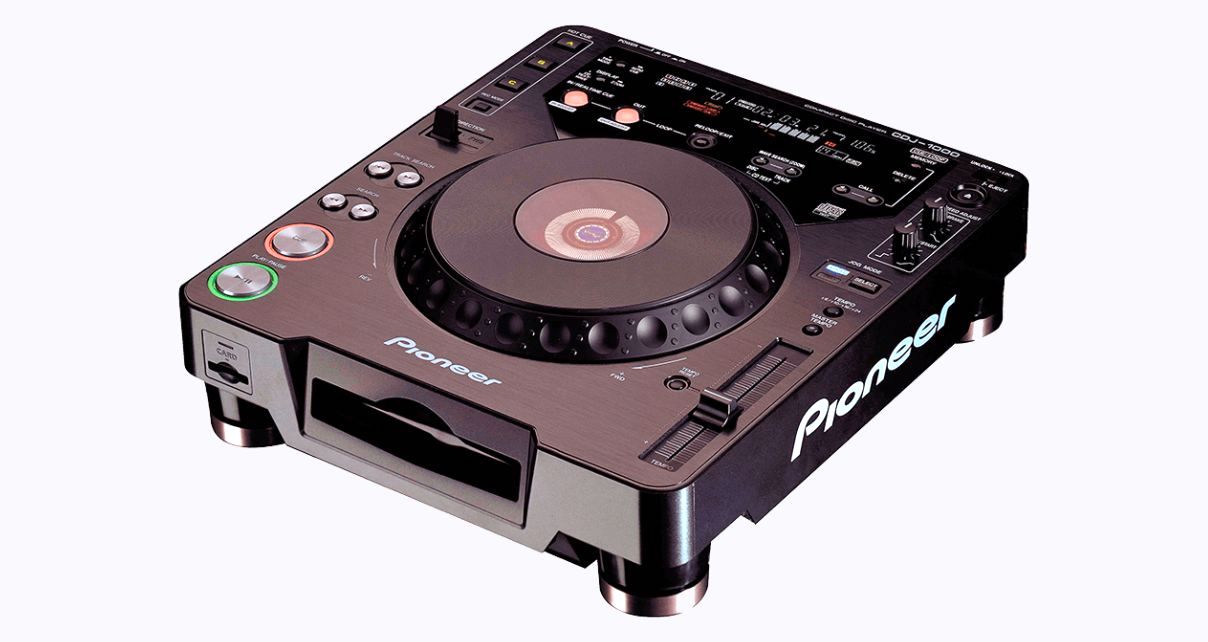 An angled front view of a single black Pioneer DJ CDJ-1000 player on a light grey background. 