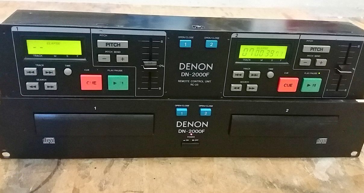 Front view of a Denon DN-2000F rack player sat on a table. 