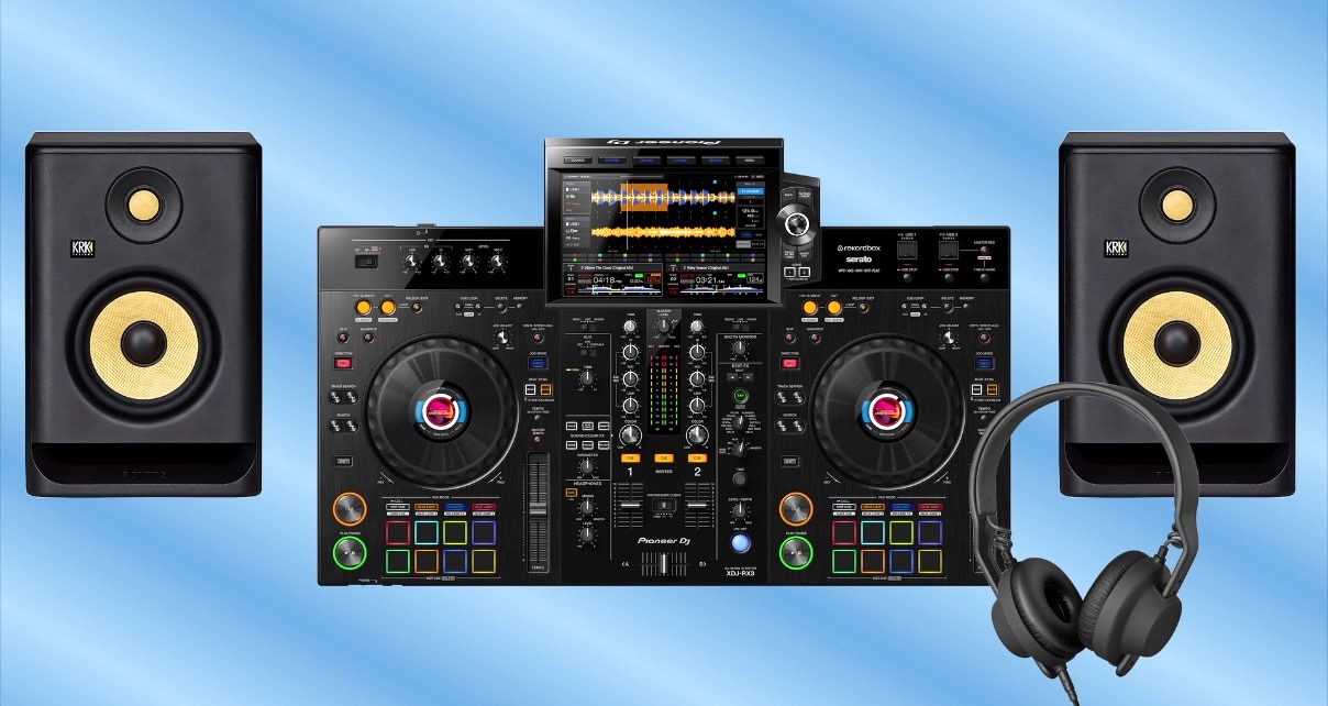 A Pioneer DJ XDJ-RX3, two KRK Rokit 5s, and AIAIAI TMA-2 headphones on a blue and white background.