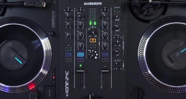 Close-up of the Allen & Heath Xone:24C mixer sandwiched between two Reloop RP-7 turntables. 