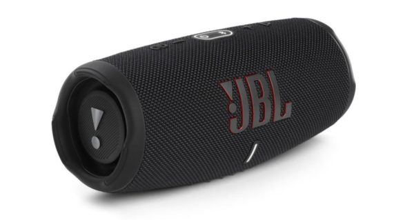 Angled view of a small JBL bluetooth speaker on a white background. 