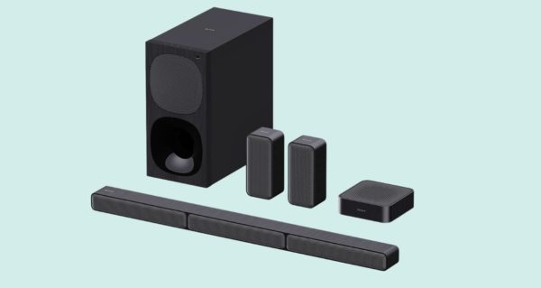 A Sony home cinema system on a mint green background. 