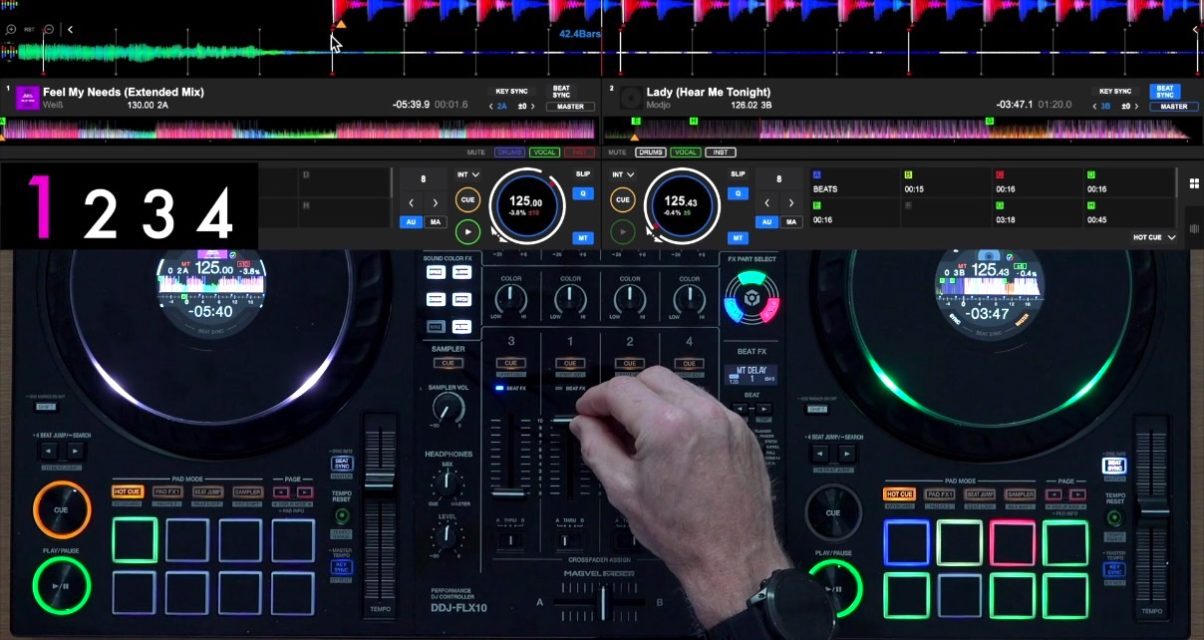 Overhead view of a Pioneer DJ DDJ-FLX10 controller showing a DJ's hand positioned over the mixer section's channel faders, with two tracks loaded on the displays showing "Feel My Needs (Extended Mix)" by Weiss at 125 BPM and "Lady (Hear Me Tonight)" by Modjo at 125.43 BPM.