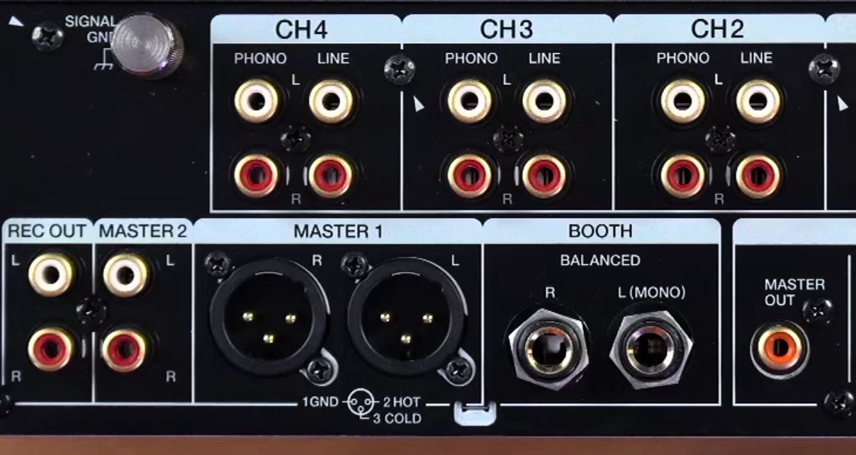 Professional DJ mixer output panel showing RCA rec out, XLR master outputs, balanced booth outputs, and master out connections. 