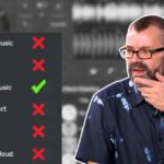 Why Serious DJs Still Buy Their Music (And Don't Rely On Streaming) Phil Morse standing next to and looking at a graphic showing streaming service logos including Apple Music, Spotify, Beatport, Tidal, and SoundCloud each marked with a red X, while Local Music is marked with a green tick. He's holding his hand to his chin with a confused expression.