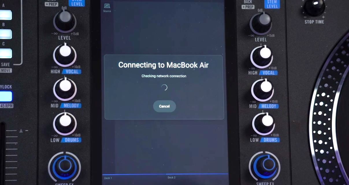 Zoomed in view of a Rane System One screen that reads "Connecting to MackBook Air" with a loading circle icon.