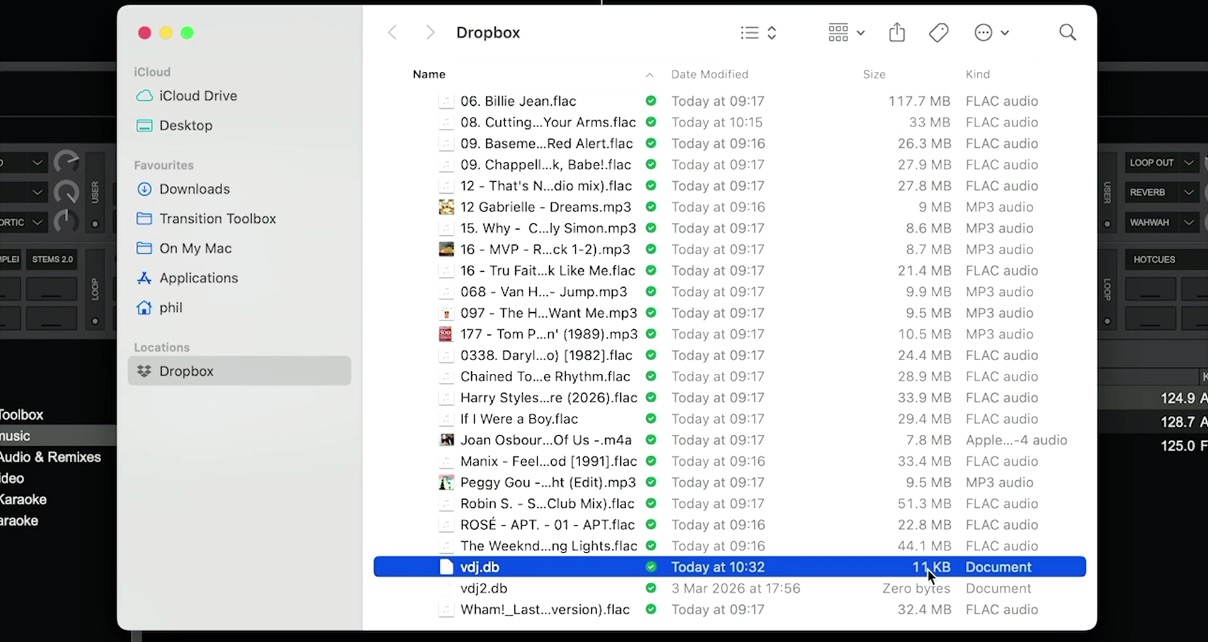 Inside a Dropbox folder showing VirtualDJ music files and database files synced via CloudDrive, including FLAC and MP3 tracks alongside the VirtualDJ database file. 