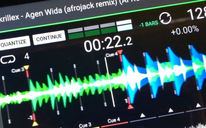 A close-up of an Engine DJ software screen showing the waveform of Skrillex's Agen Wida (Afrojack Remix) at 128 BPM, with cue points marked and a dense, blue and green waveform visible.