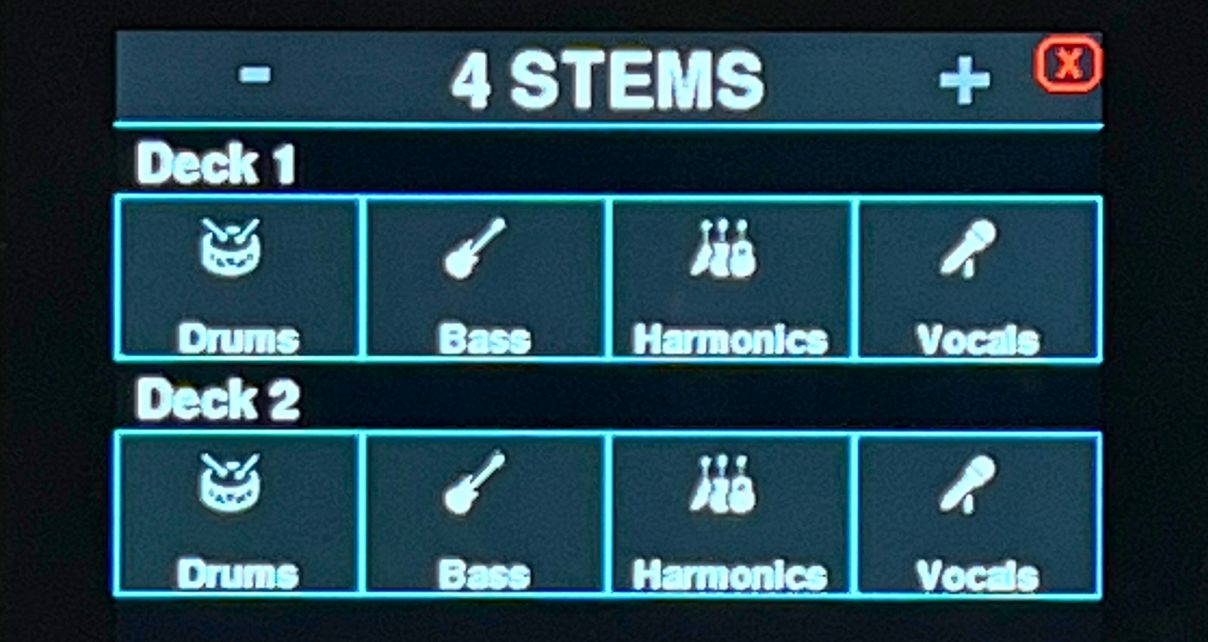 Close-up of the DJ Touch 1 Deluxe touchscreen showing the four-stems control interface for two decks, with Drums, Bass, Harmonics and Vocals buttons displayed for both Deck 1 and Deck 2. 